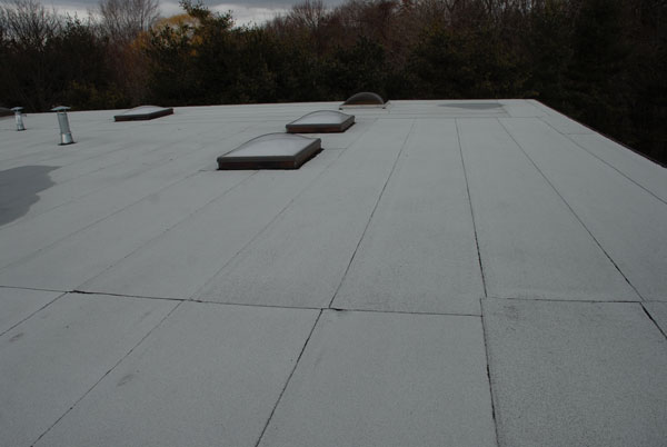 This image shows a 2 ply Modified Bitumen torch down roofing system. This image shows a 2 ply Modified Bitumen torch down roofing system.